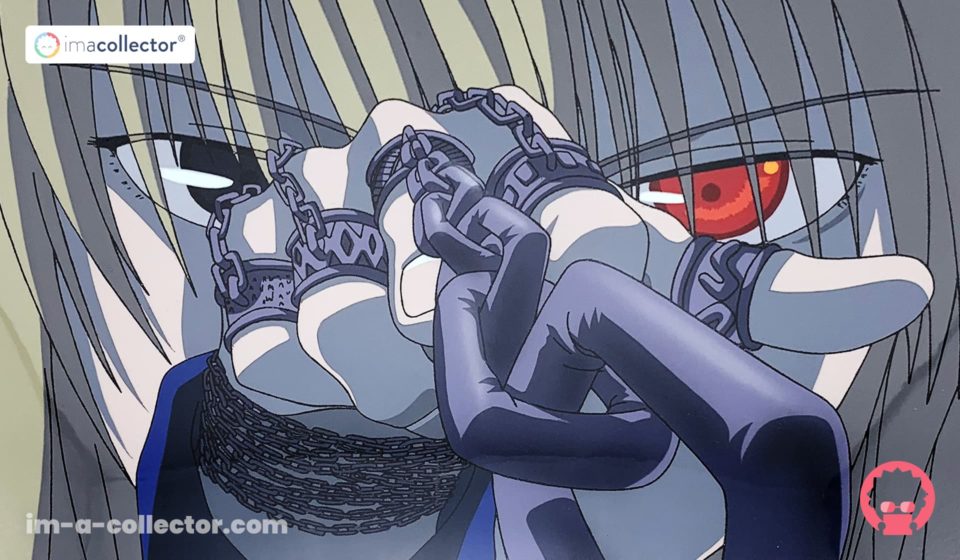 Rilezu officiel de Kurapika aux yeux écarlates, avec chaînes au premier plan, issu de l’anime Hunter × Hunter de 1999.