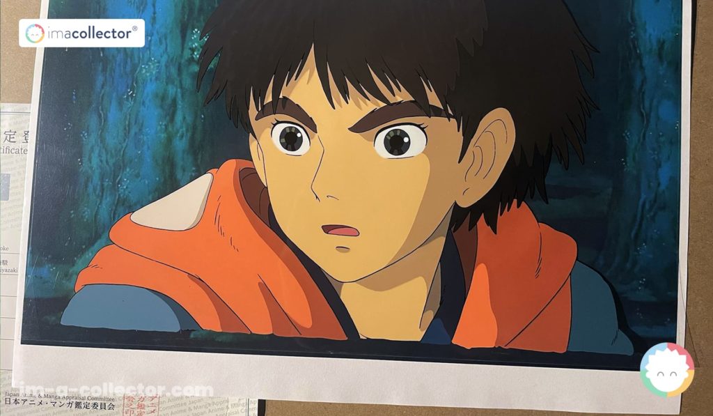 Studio Ghibliによる『もののけ姫』のセル画とその真正性証明書。日本アニメーションの記憶に結びつくアーカイブ資料として提示されている。