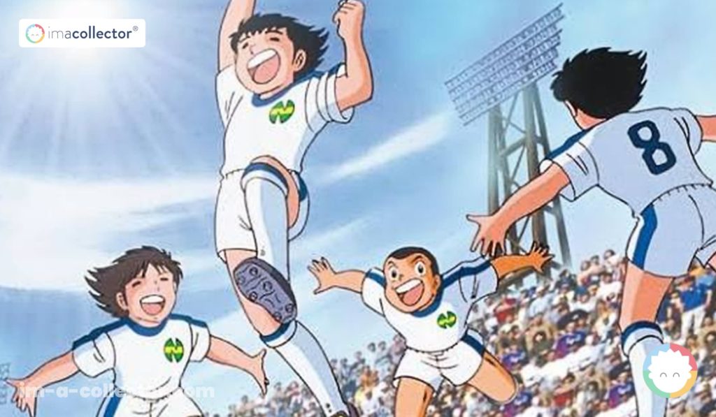 Tsubasa Ozora enfant célèbre un but avec les membres de l’équipe de Nankatsu dans l’anime Captain Tsubasa des années 1980.