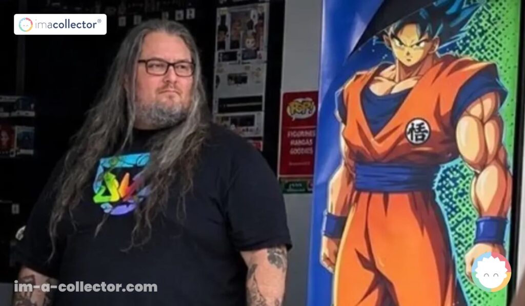 Pierre Collin, gérant du Micromania de Nice, devant une affiche de Son Goku après le pillage du 17 octobre 2026.